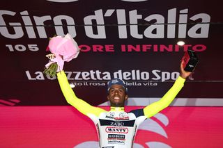 JESI ITALY MAY 17 Hailu Biniam Girmay of Eritrea and Team Intermarch Wanty Gobert Matriaux celebrates winning the stage on the podium ceremony after the 105th Giro dItalia 2022 Stage 10 a 196km stage from Pescara to Jesi 95m Giro WorldTour on May 17 2022 in Jesi Italy Photo by Tim de WaeleGetty Images