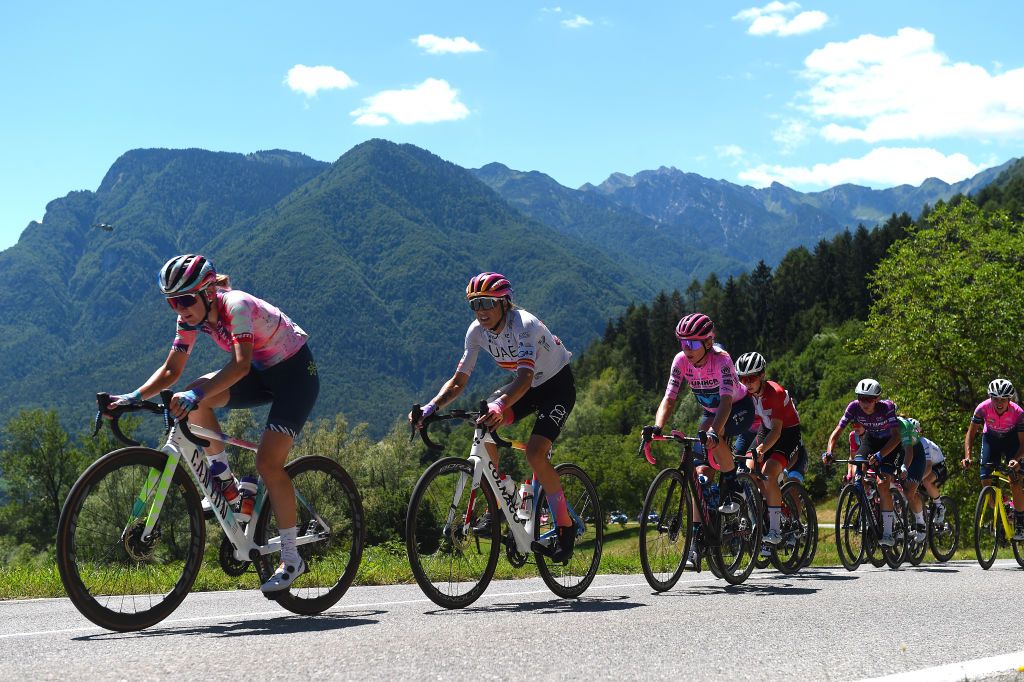 SAN LORENZO DORSINO ITALY JULY 09 LR Margarita Victoria Garcia Caellas of Spain and UAE Team Adq and Annemiek Van Vleuten of Netherlands and Movistar Team Pink Leader Jersey compete during the 33rd Giro dItalia Donne 2022 Stage 9 a 1128km stage from San Michele AllAdige to San Lorenzo Dorsino 727m GiroDonne UCIWWT on July 09 2022 in San Lorenzo Dorsino Italy Photo by Dario BelingheriGetty Images