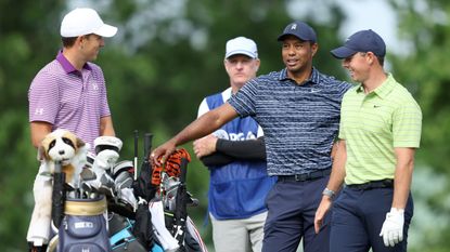 Jordan Spieth, Tiger Woods and Rory McIlroy chat at the 2022 PGA Championship