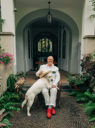 Manolo Blahnik with his dog