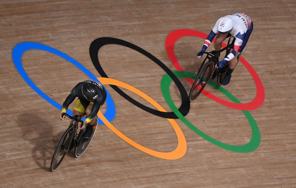 Britains Jason Kenny R and Malaysias Mohd Azizulhasni Awang compete in a heat of the mens track cycling sprint 132 finals during the Tokyo 2020 Olympic Games at Izu Velodrome in Izu Japan on August 4 2021 Photo by Peter PARKS AFP Photo by PETER PARKSAFP via Getty Images