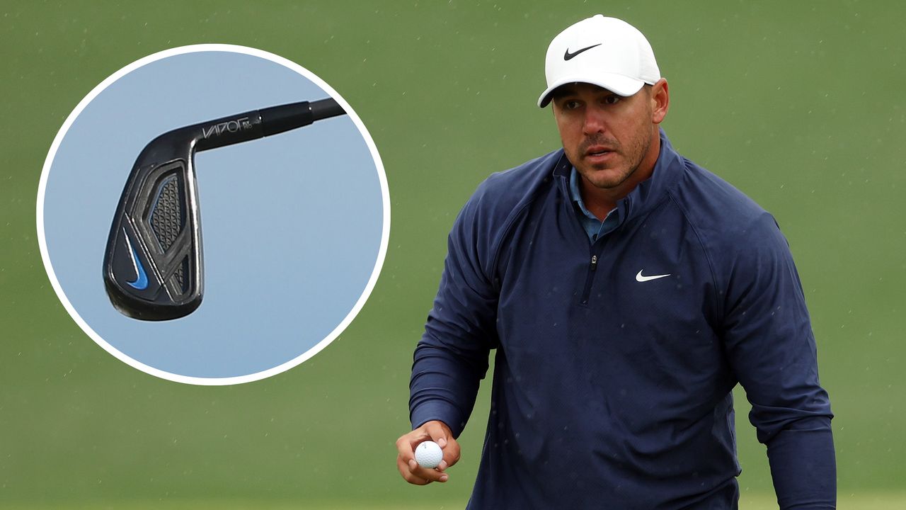 Koepka waves to the crowd with Nike iron in a bubble