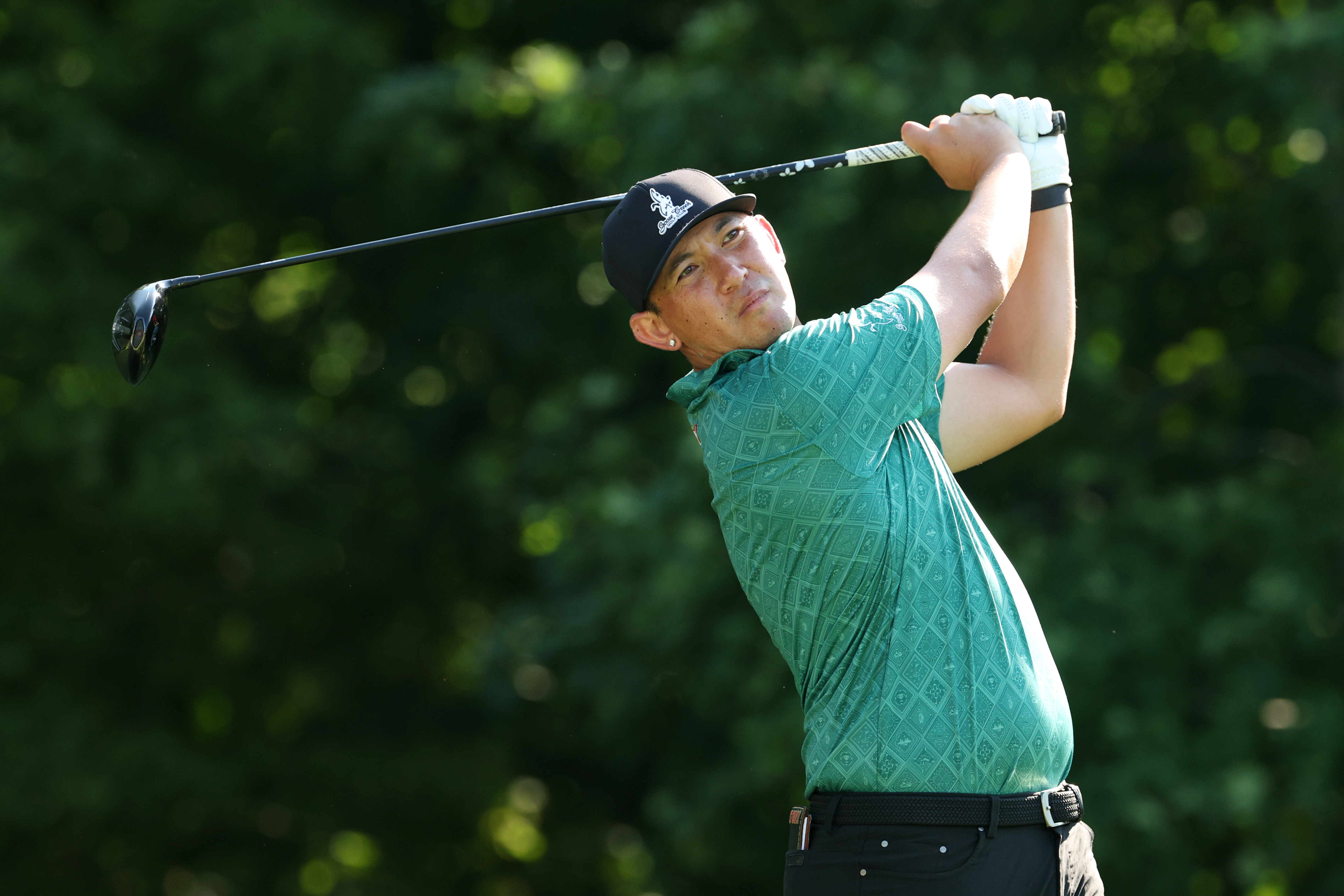 Rico Hoey hits a driver off the tee