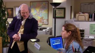 A Ben Franklin impersonator flirts with Pam (Jenna Fischer)