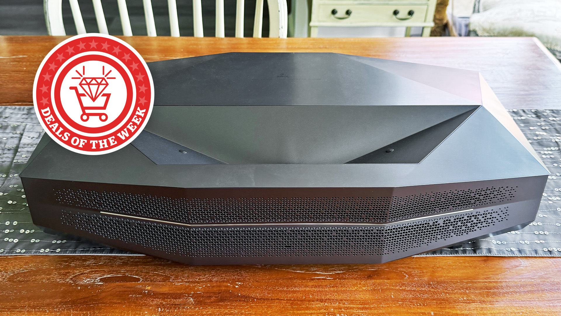 A picture of the AWOL Vision Artherion Max UST Projector with the Deals of the Week logo overlaid 