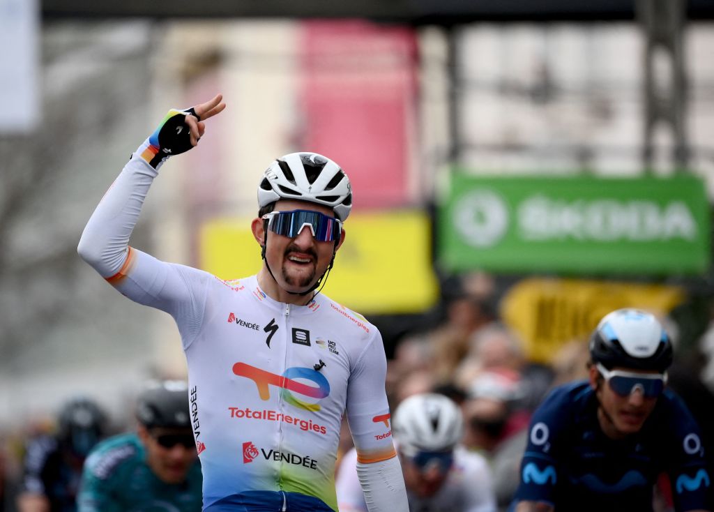 TotalEnergies French rider Mathieu Burgaudeau celebrates as he crosses the finish line to win the 6th stage of the 80th Paris Nice cycling race 214 km between Courthezon and Aubagne on March 11 2022 Photo by FRANCK FIFE AFP Photo by FRANCK FIFEAFP via Getty Images