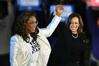 Democratic presidential nominee, U.S. Vice President Kamala Harris speaks alongside Oprah Winfrey during the closing rally of her campaign at the base of the iconic "Rocky Steps" at the Philadelphia Museum of Art on November 05, 2024 in Philadelphia, Pennsylvania. With one day to go until election day, Vice President Kamala Harris is campaigning across Pennsylvania.