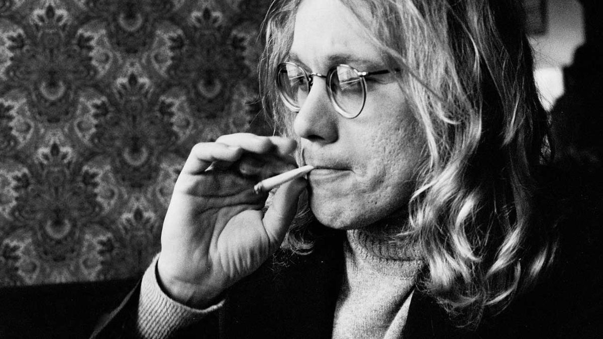 Warren Zevon smoking a cigarette