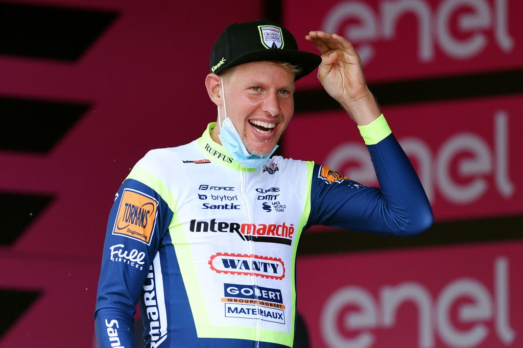 CANALE ITALY MAY 10 Taco Van Der Hoorn of Netherlands and Team Intermarch Wanty Gobert Matriaux celebrates at podium during the 104th Giro dItalia 2021 Stage 3 a 190km stage from Biella to Canale Trophy Champagne girodiitalia Giro on May 10 2021 in Canale Italy Photo by Tim de WaeleGetty Images