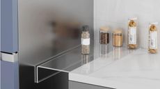 a clear countertop extender in a kitchen