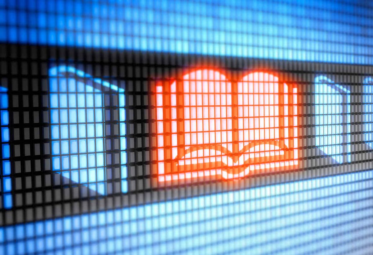 Glowing electronic image of open book 