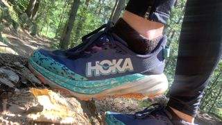 Runner's foot wearing the Hoka Speedgoat 6