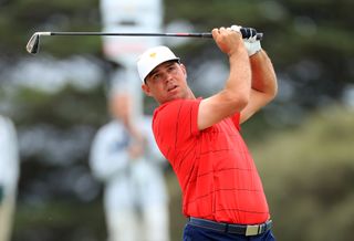 Gary Woodland plays an iron shot during the 2019 Presidents Cup