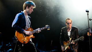 Jack Moore and Joe Bonamassa perform on stage in a tribute to Jack's father Gary Moore, as part of the Sunflower Jam charity, supporting the integration of conventional and complimentary therapy, at Royal Albert Hall on July 8, 2011 in London, United Kingdom