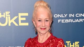 Helen Mirren wearing dewy foundation and pink blush with red lipstick