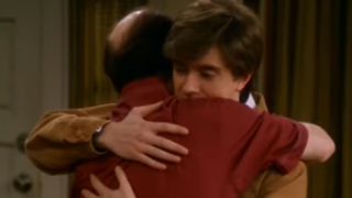 Eric Foreman hugging his father goodbye in That '70s Show.