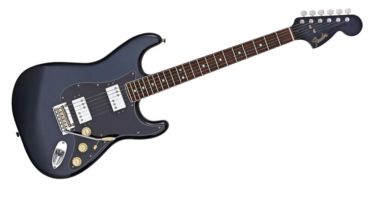 Body and headstock face are finished in Mercedes Blue, a dark blue with fine metallic fleck