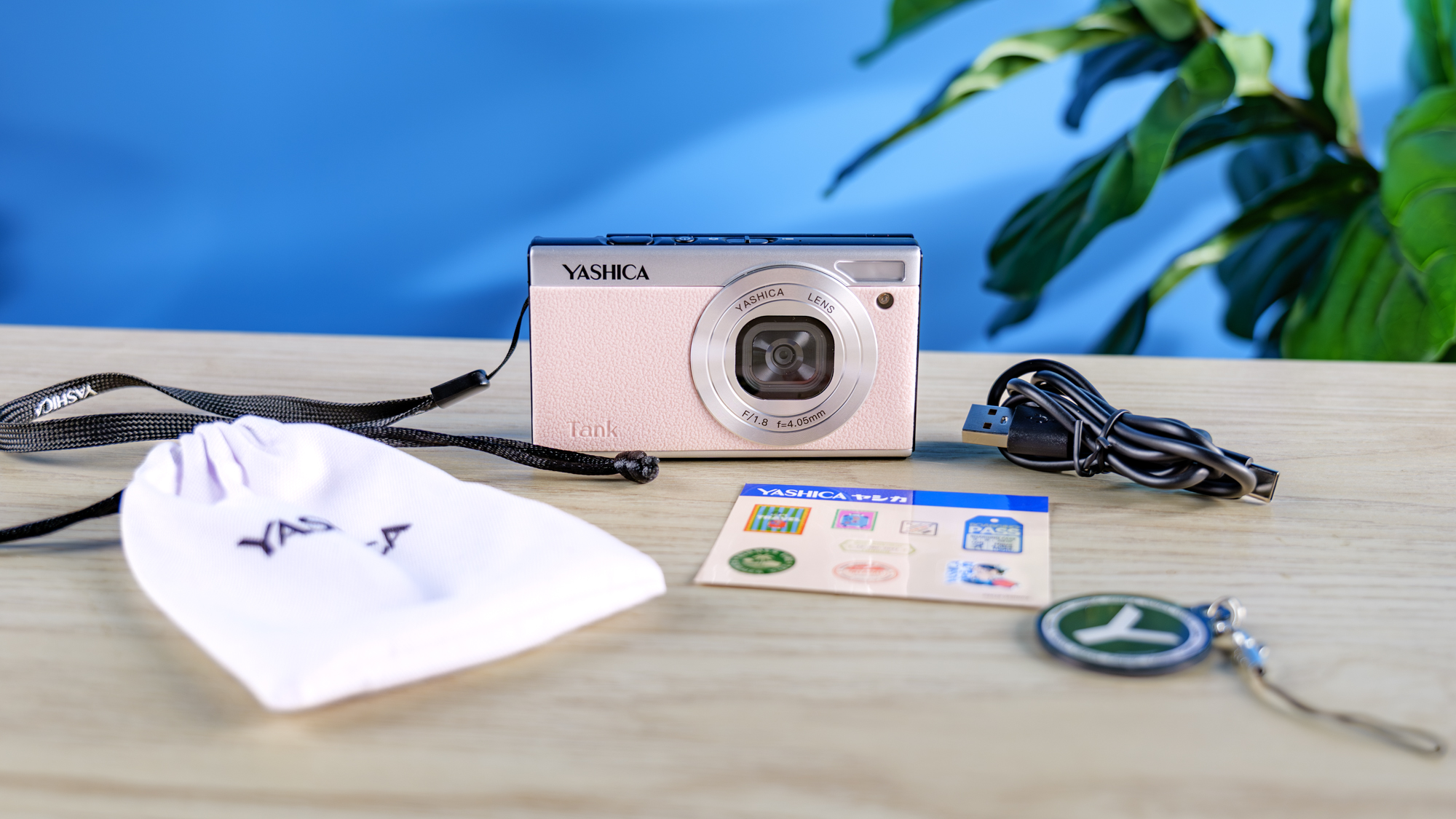 Yashica Tank in pink photographed in front of a blue background