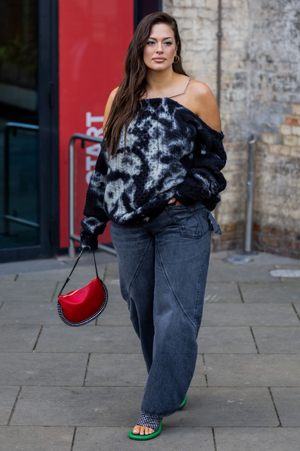 Ashley Graham carrying the JW Anderson Bumper bag