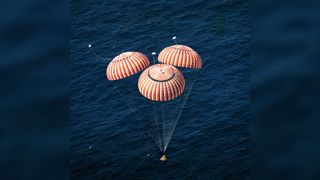 On April 27, 1972, astronauts John W. Young, Thomas K. Mattingly II, and Charles M. Duke Jr., return safely to Earth