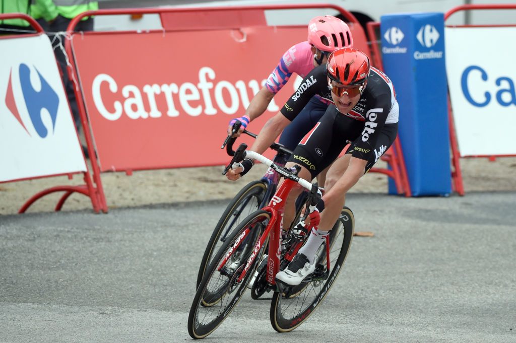 Stage winner Team Lotto rider Belgiums Tim Wellens sprints to cross the finish line of the 14th stage of the 2020 La Vuelta cycling tour of Spain a 2047km race from Lugo to Ourense on November 4 2020 Photo by MIGUEL RIOPA AFP Photo by MIGUEL RIOPAAFP via Getty Images