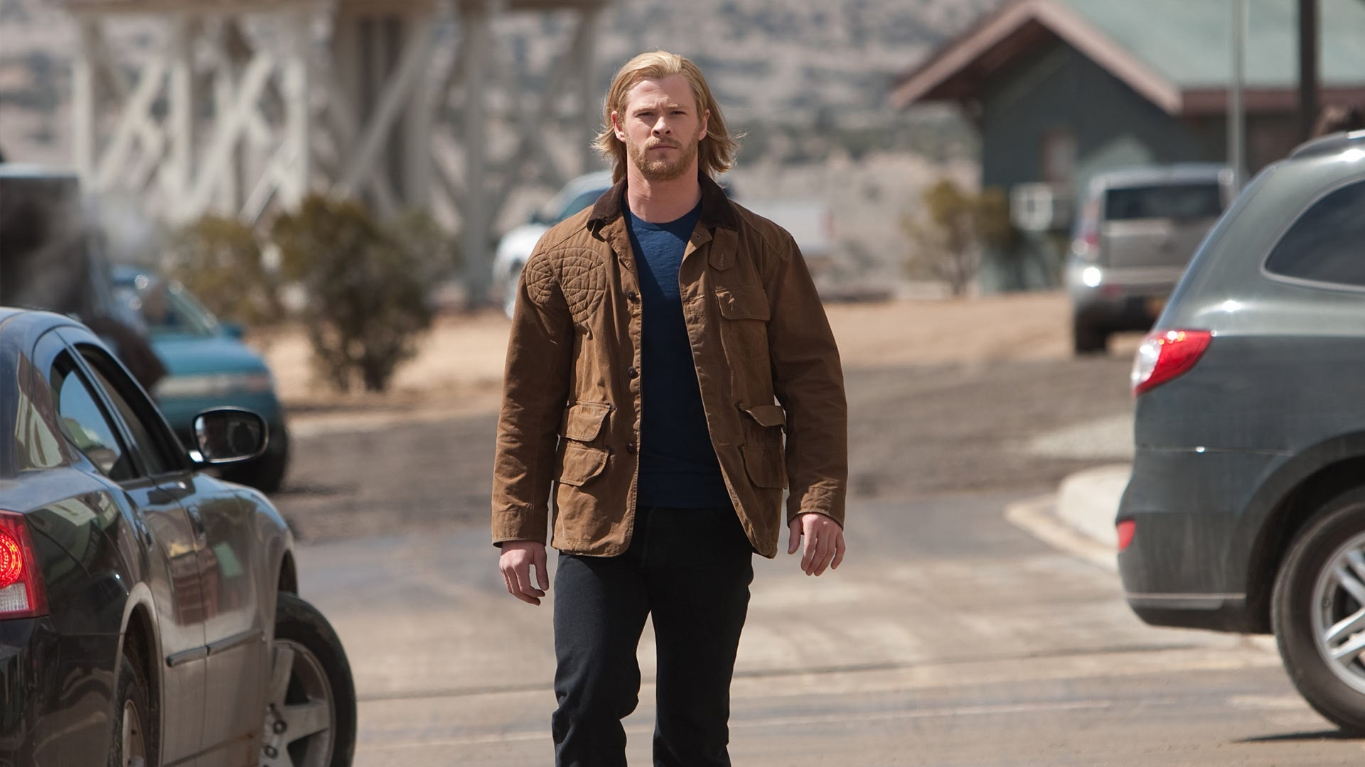 Screenshot from the 2011 sci-fi superhero movie "Thor" showing Chris Hemsworth as Thor in human clothing.