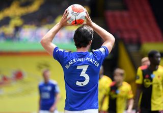 Leicester's Ben Chilwell takes a throw-in, with Black Lives Matter written on the back of his shirt