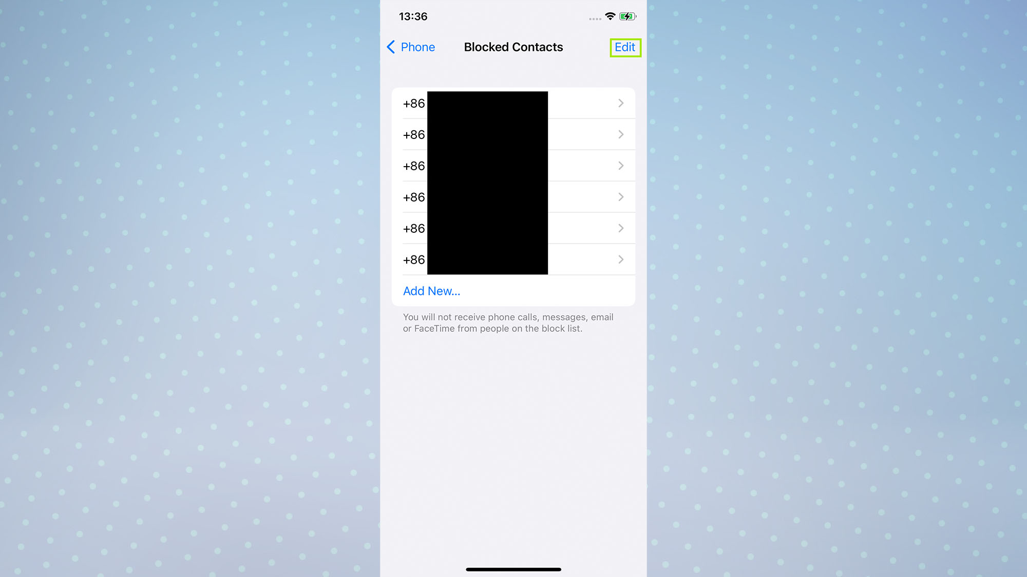 A screenshot of an iPhone screen showing blocked contacts