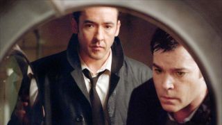 John Cusack and Ray Liotta in Identity