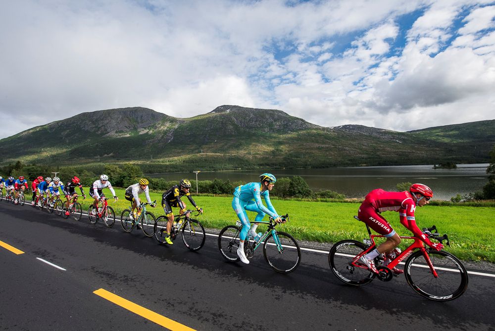 Cyclists ride during the 198,5 km second stage of the Arctic Race of Norway between Mo i Rana and Sandnessjoen
