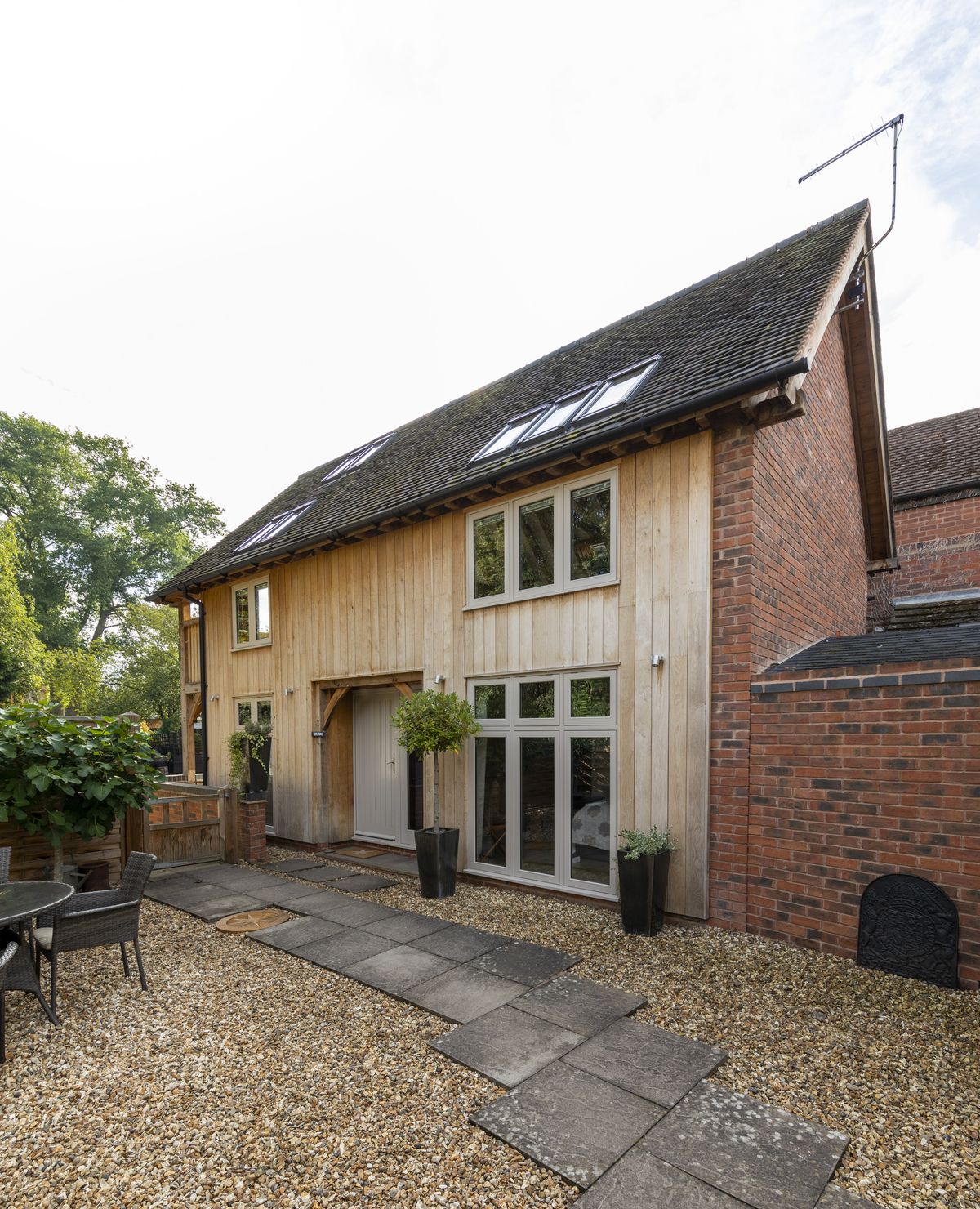 oak frame self build with timber cladding and open plan kitchen