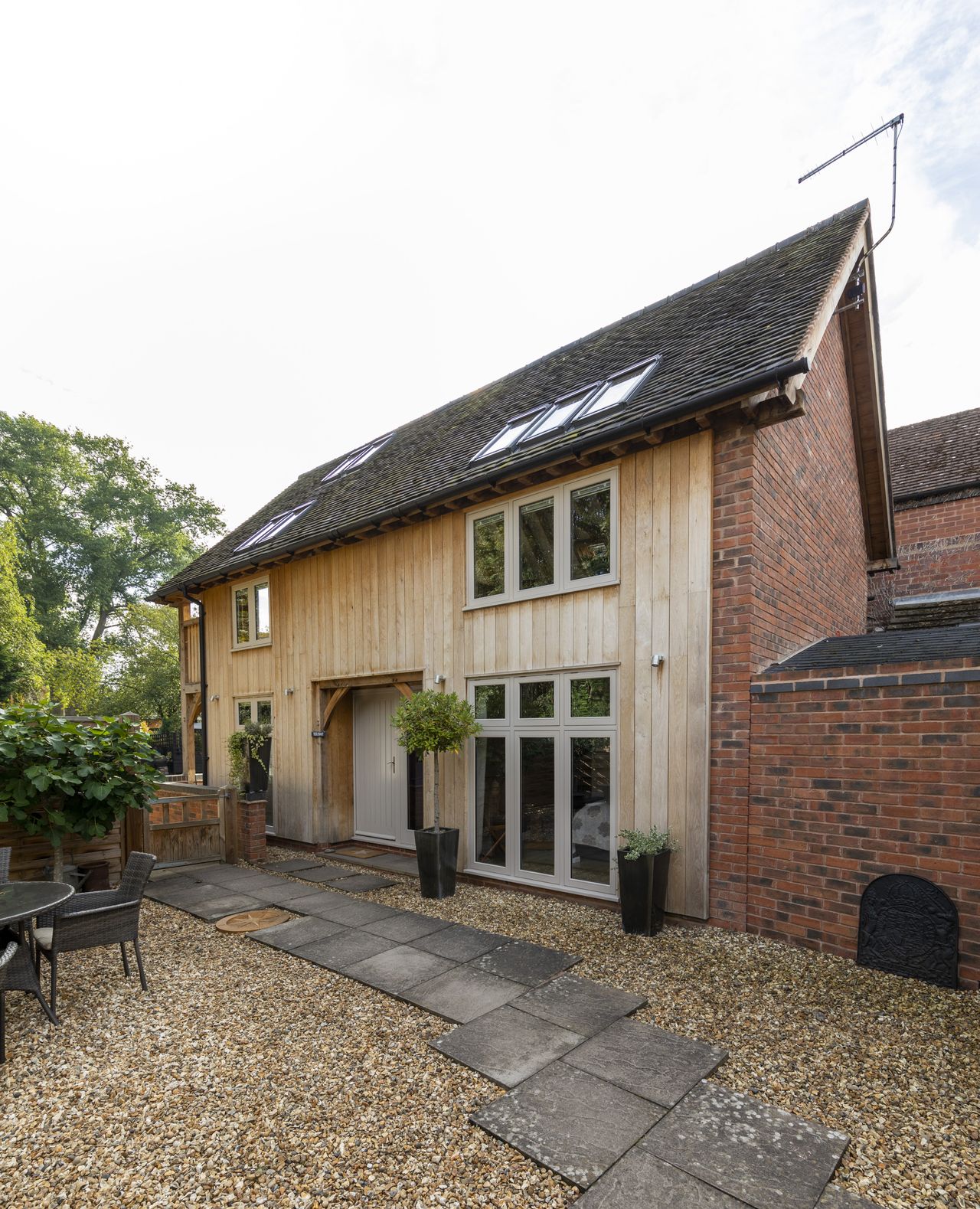 oak frame self build with timber cladding and open plan kitchen