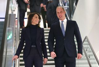 Britain's Prince William, Prince of Wales, and Catherine, Princess of Wales, arrive at Boston Logan International Airport on November 30, 2022.