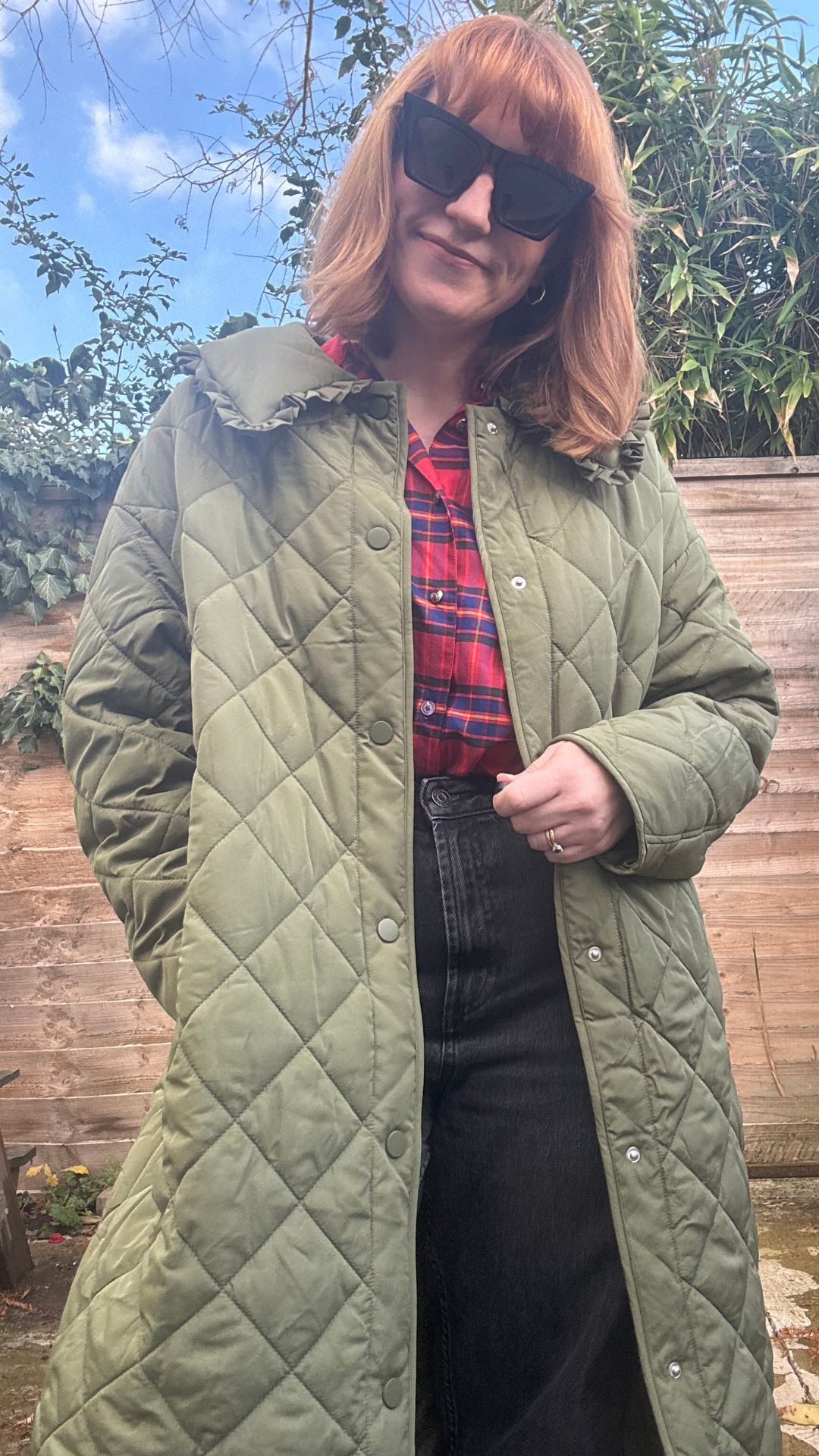 matilda wearing the miss selfridge green coat