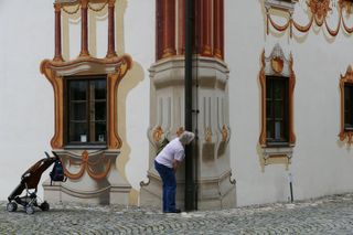 Woman looking at Trompe L’Oeil painting