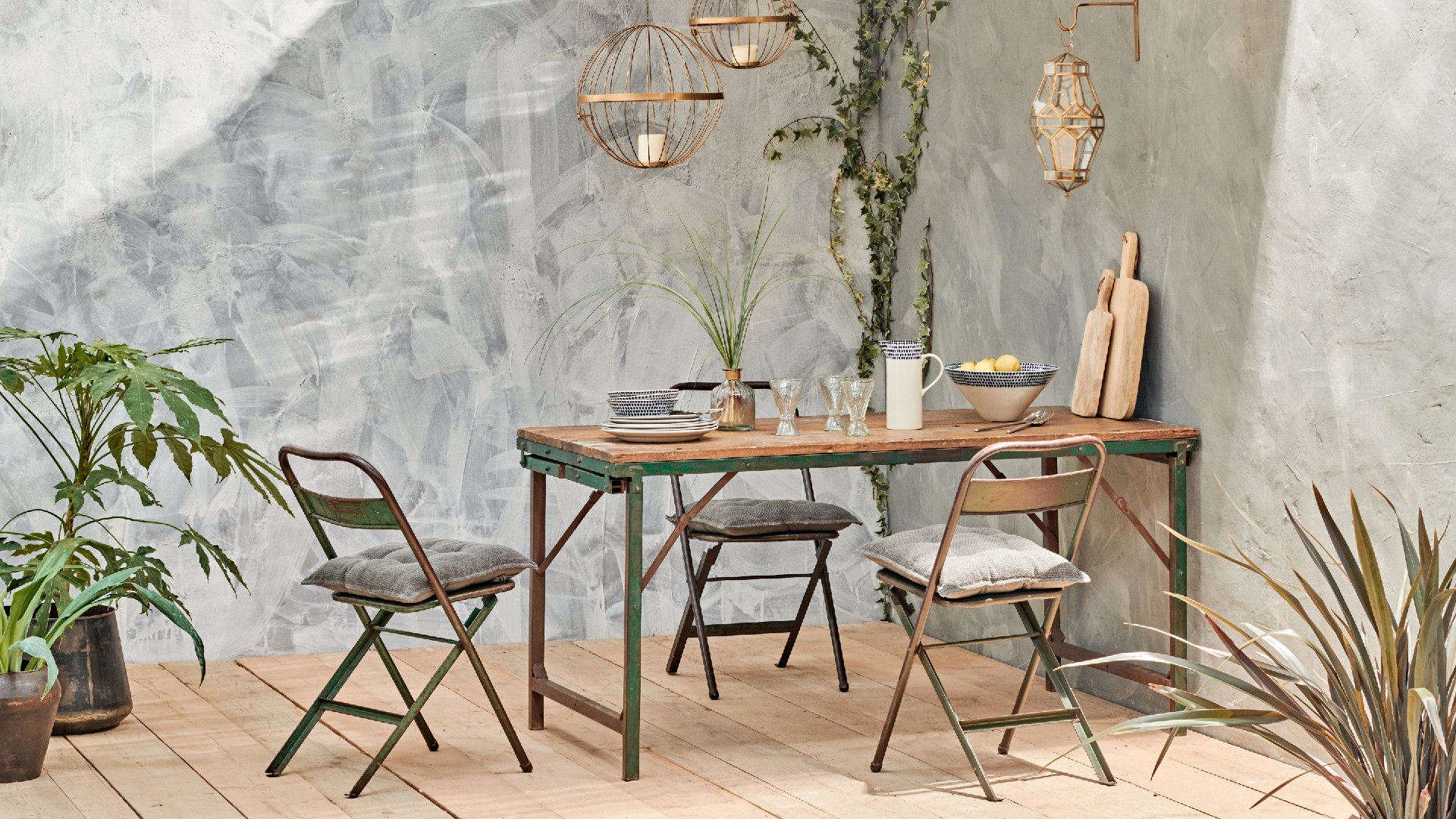 Best metal garden furniture 2021 - reclaimed metal table and chairs - Nkuku