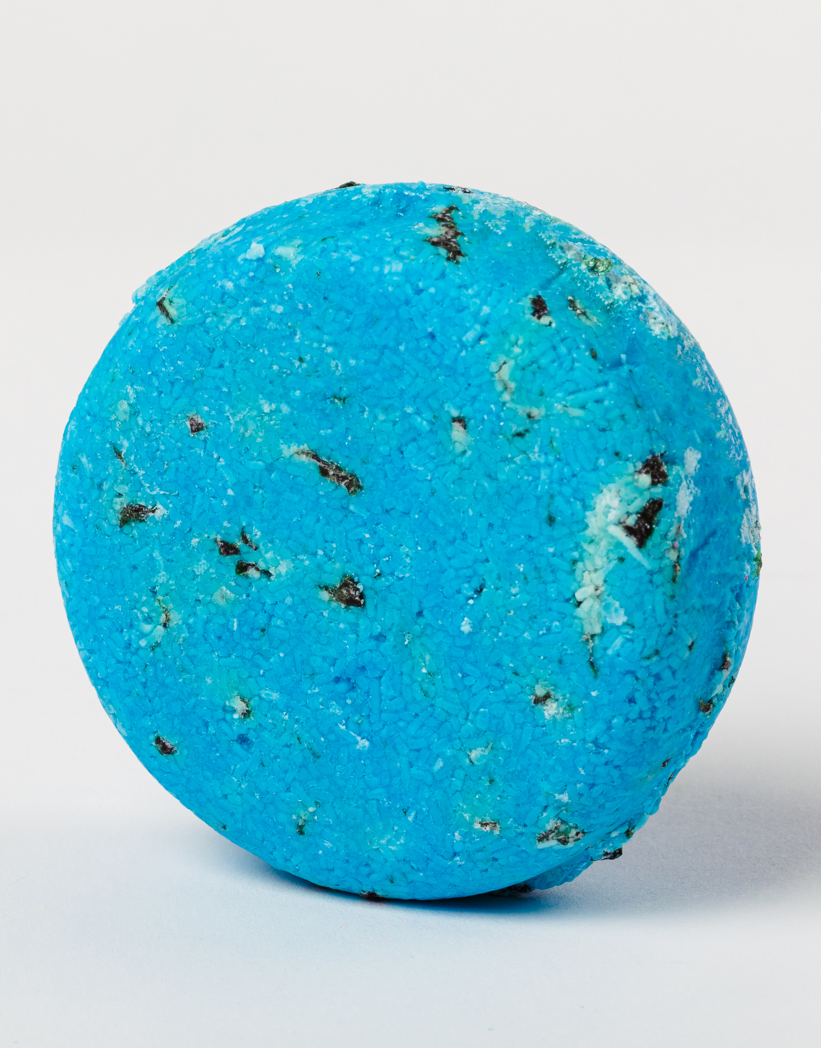 A blue Lush Seanik shampoo bar