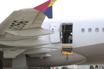 An Asiana Airlines flight that had its emergency door opened midair. 