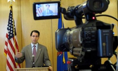 During a news conference June 28, Wisconsin Gov. Scott Walker (R) said his state would not move ahead with implementing the federal health care law, despite the Supreme Court's ruling.