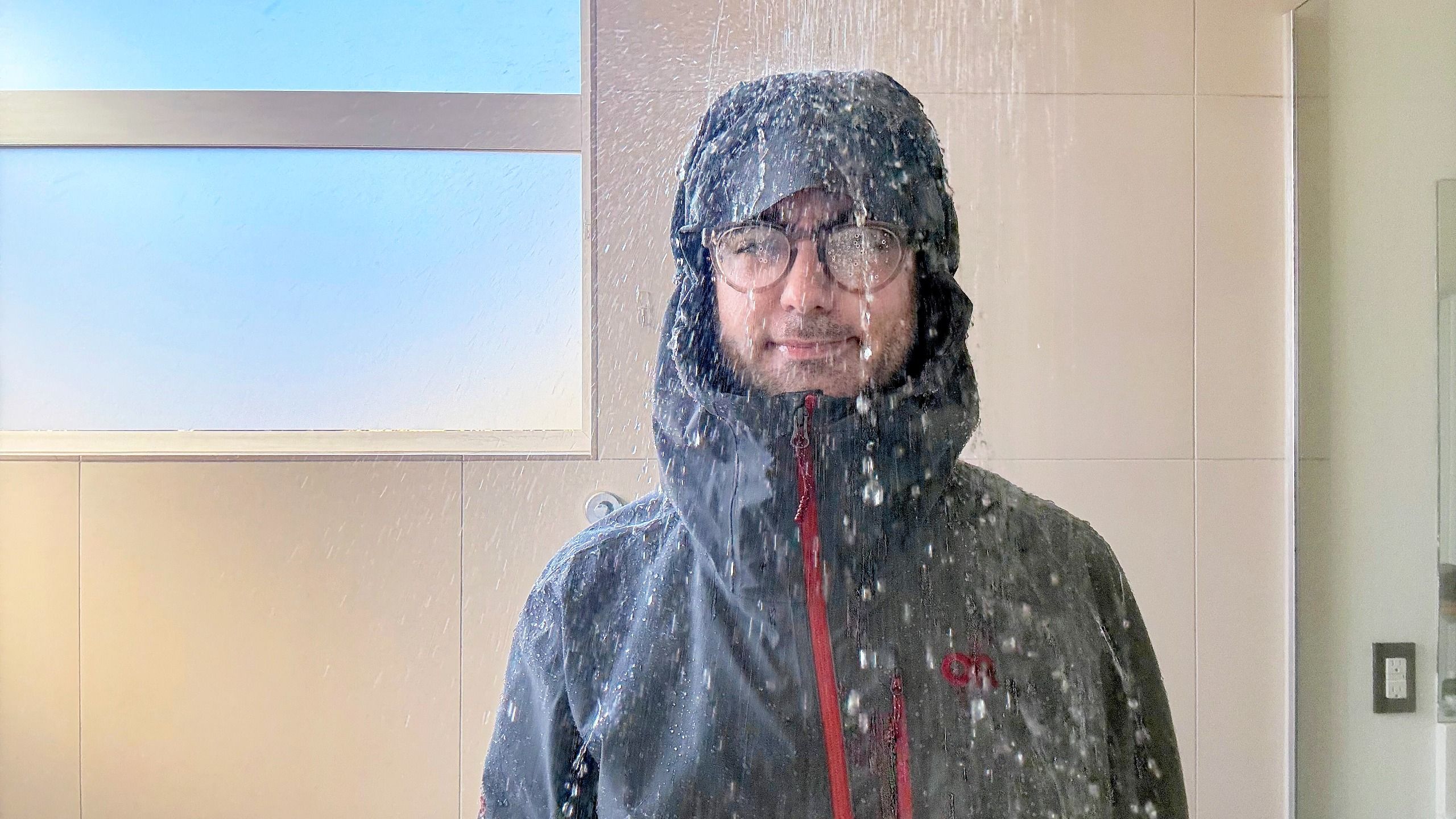 I wore Outdoor Research's triple-layer rain jacket in the shower — and I'm blown away by the performance