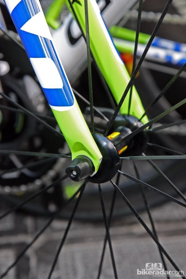 Trek built extra raked-out fork blades offset by rear-facing dropouts into the new Domane but Cannondale did a similar thing with its SuperSix Evo, too. Also note the sleek aluminum hub shell and bladed stainless steel spokes on the new Mavic carbon tubular wheel.