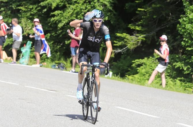 Chris Froome (Sky) cools off with some water