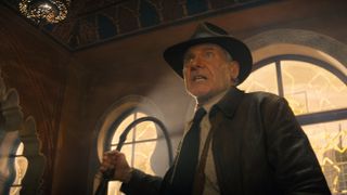 Indiana Jones with a whip in Indiana Jones and the Dial of Destiny