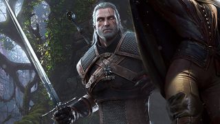 Geralt in The Witcher holding a sword