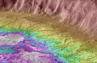 A colored topographical map of the southern highlands Martian basins from the Brown University study. The raised ridges are colored dark yellow and the low-lying areas where water pooled are colored in white.