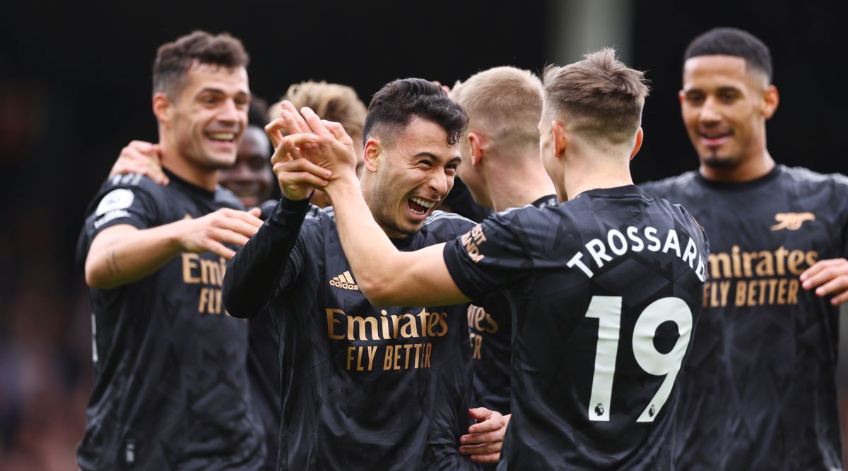 Arsenal players celebrate after Gabriel Martinelli scored the team&#039;s second goal during the Premier League match between Fulham and Arsenal at Craven Cottage on March 12, 2023 in London, United Kingdom.