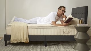 Birch Luxe Natural mattress with a person lying on their stomach