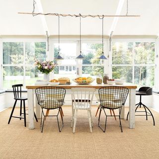 dining area with dining table and chair and carpet
