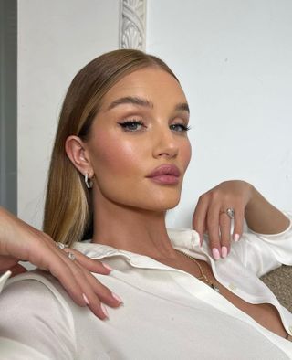 Rosie Huntington-Whiteley with a baby pink manicure