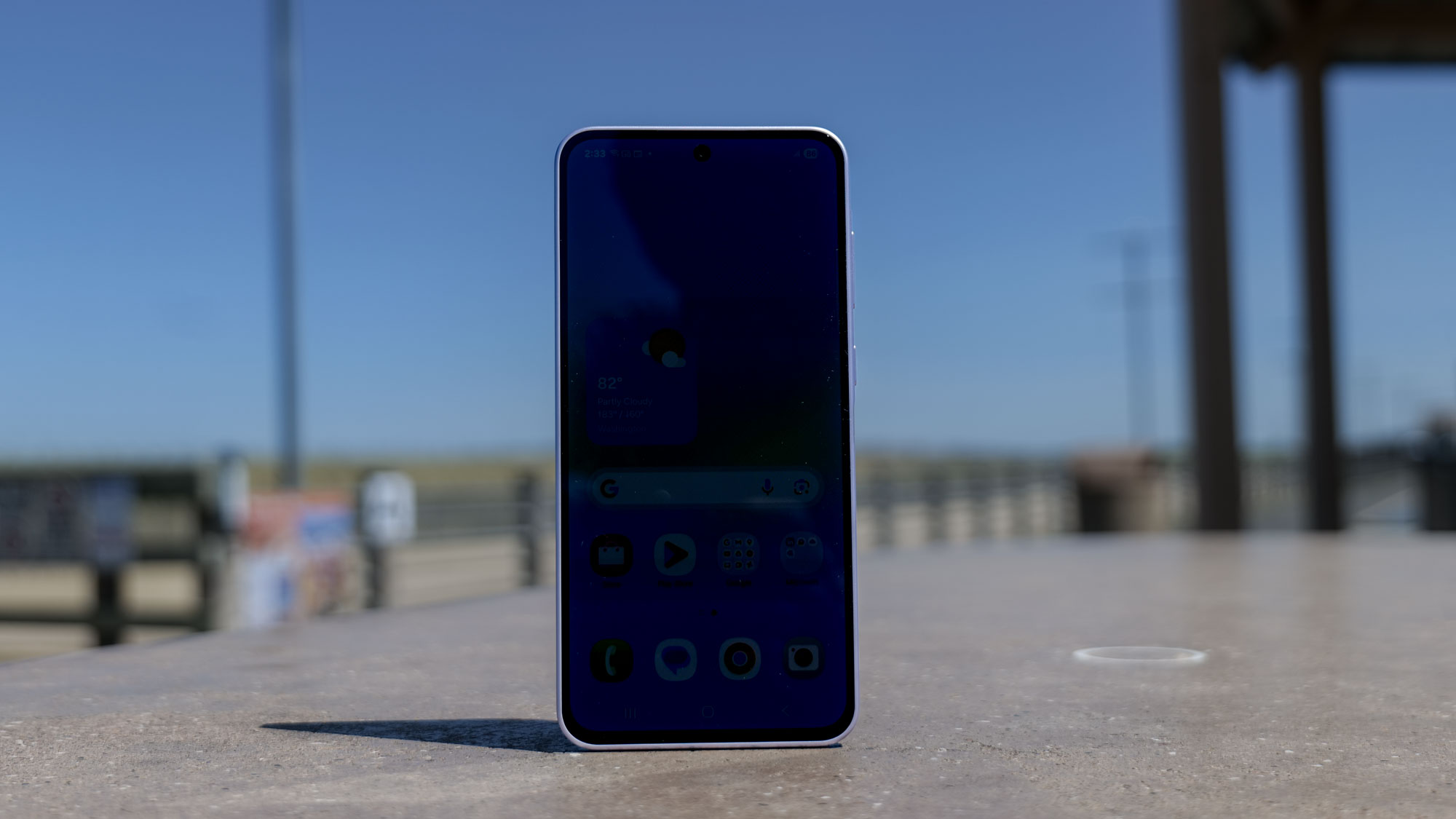 Samsung Galaxy A36 dim display outdoors.